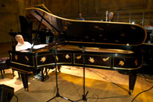 Roger at his golden Steinway piano. See Roger at his piano at the Iowa Hall of Pride website, www.iowahallofpride.com/